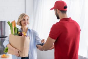 Worker Delivery Groceries | Home Delivery Software Tool | RouteSavvy Routing Software